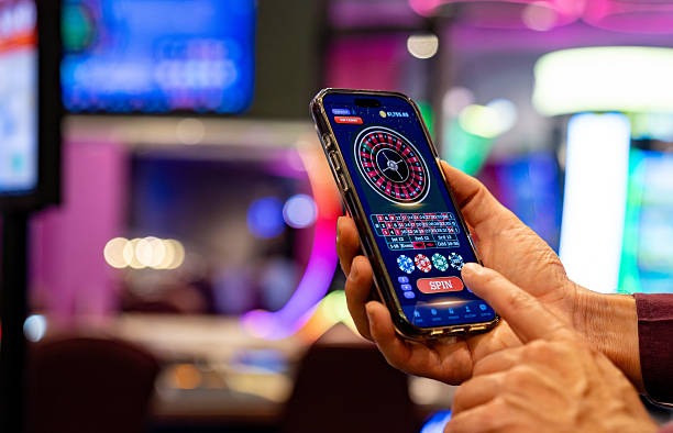 indobetpoker app showing live football match odds and casino game selection